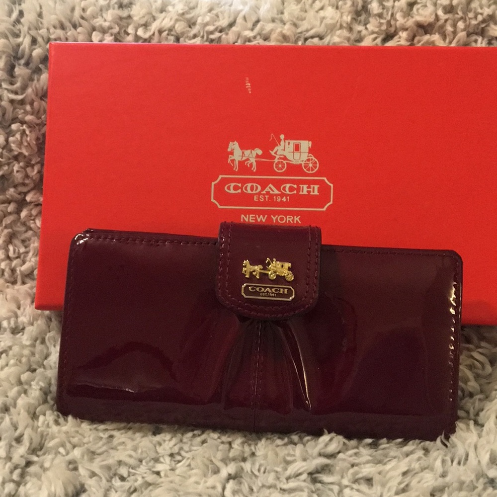 Burgundy patent leather Coach “Zippy” wallet